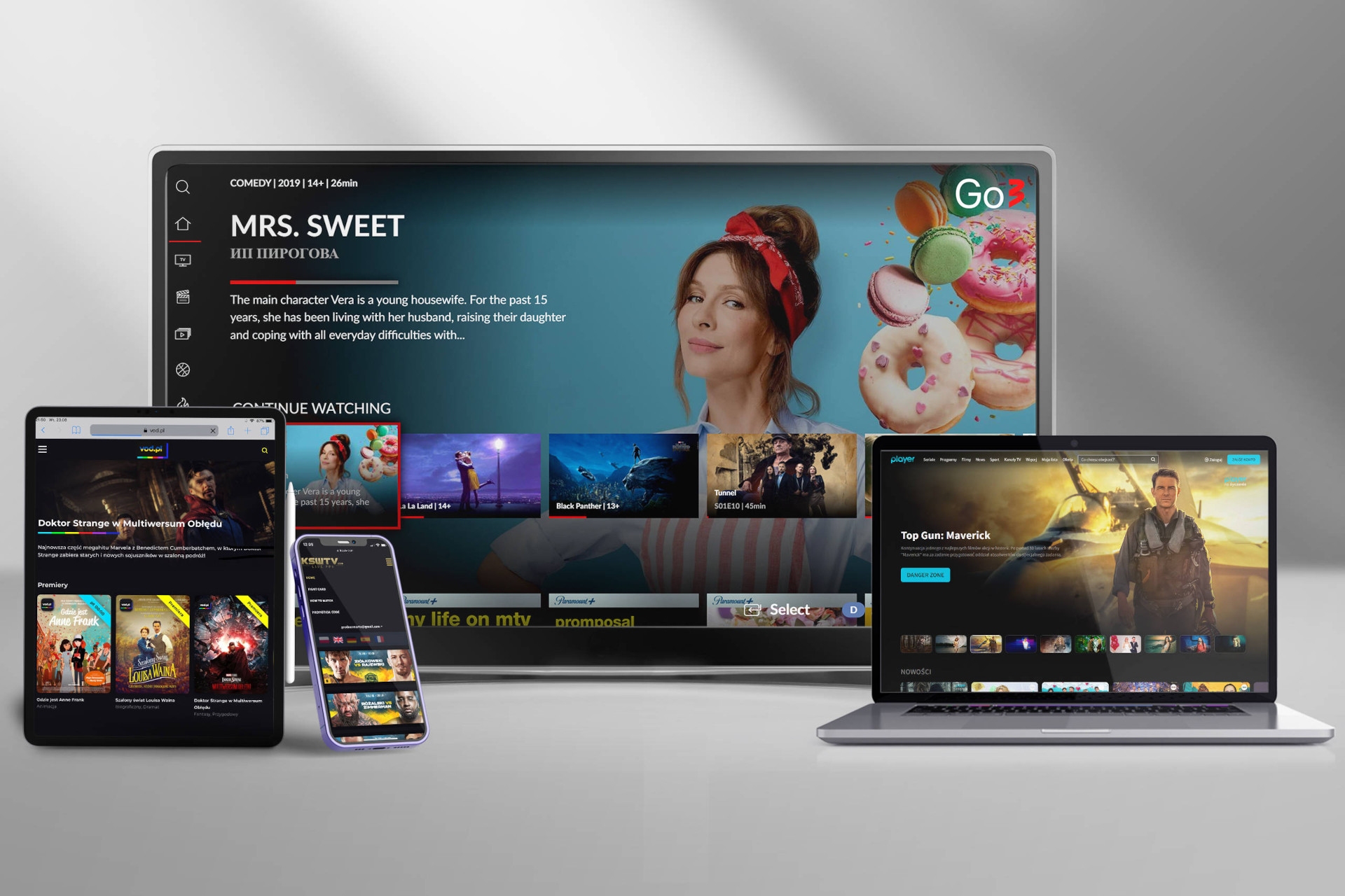Smart TV, tablet, mobile phone, and laptop with streaming apps on screens. All devices are on a white background with visible shadows.